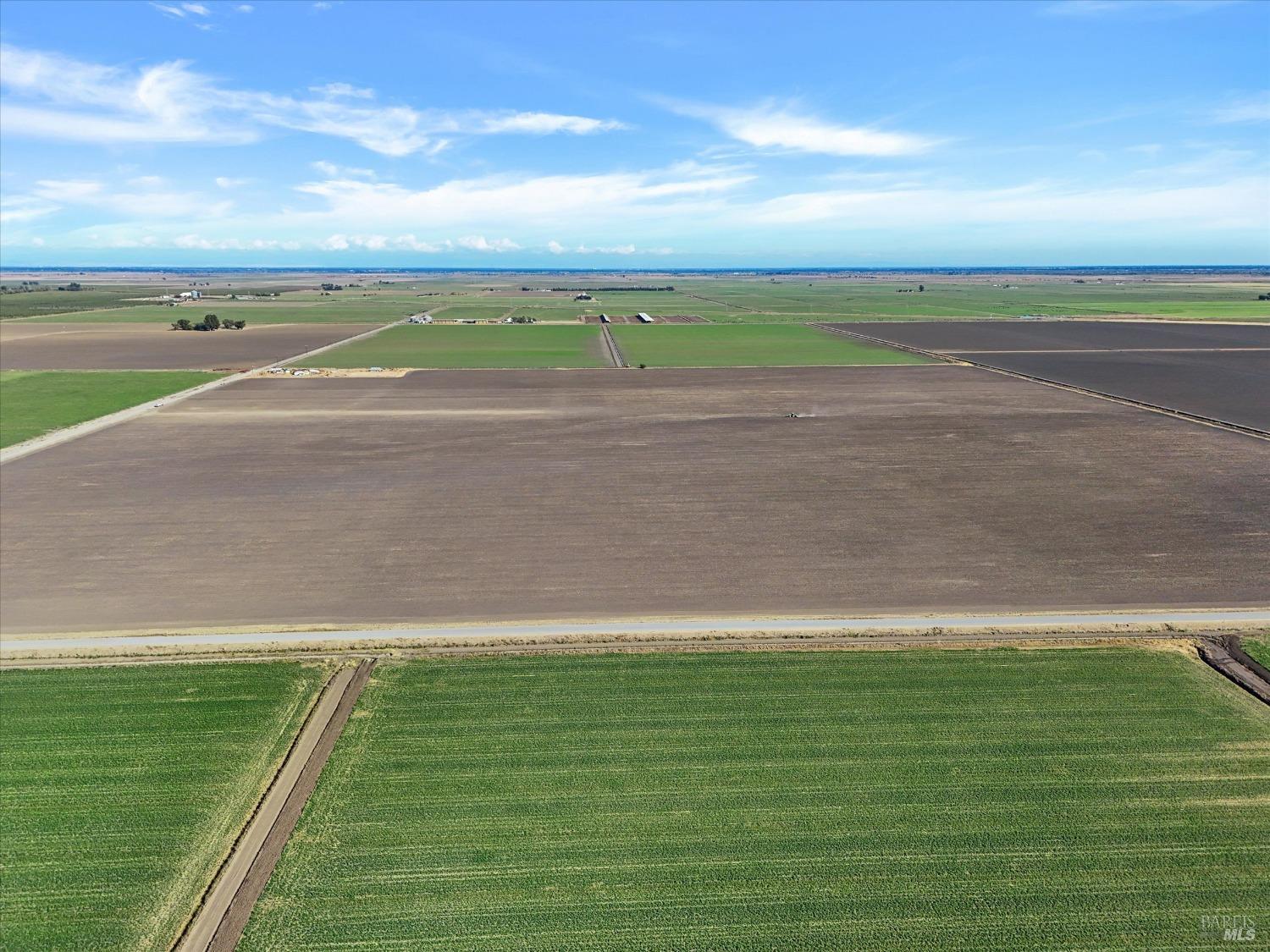 7788 Trefoil Road Dixon, CA 95620 - Photo 2 of 11 a view of an ocean and a yard