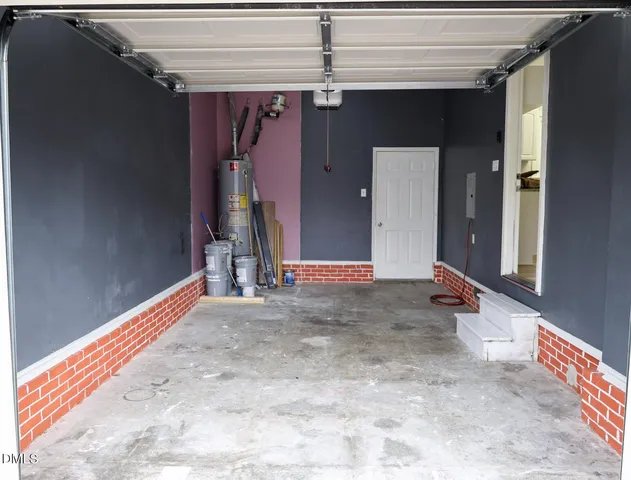 a view of swimming pool with a lounge chairs