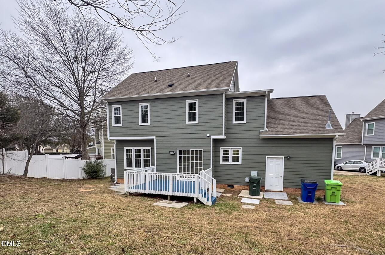 4204 Belington Court Raleigh, NC 27604 - Photo 16 of 18 a backyard of a house with fire pit and couch