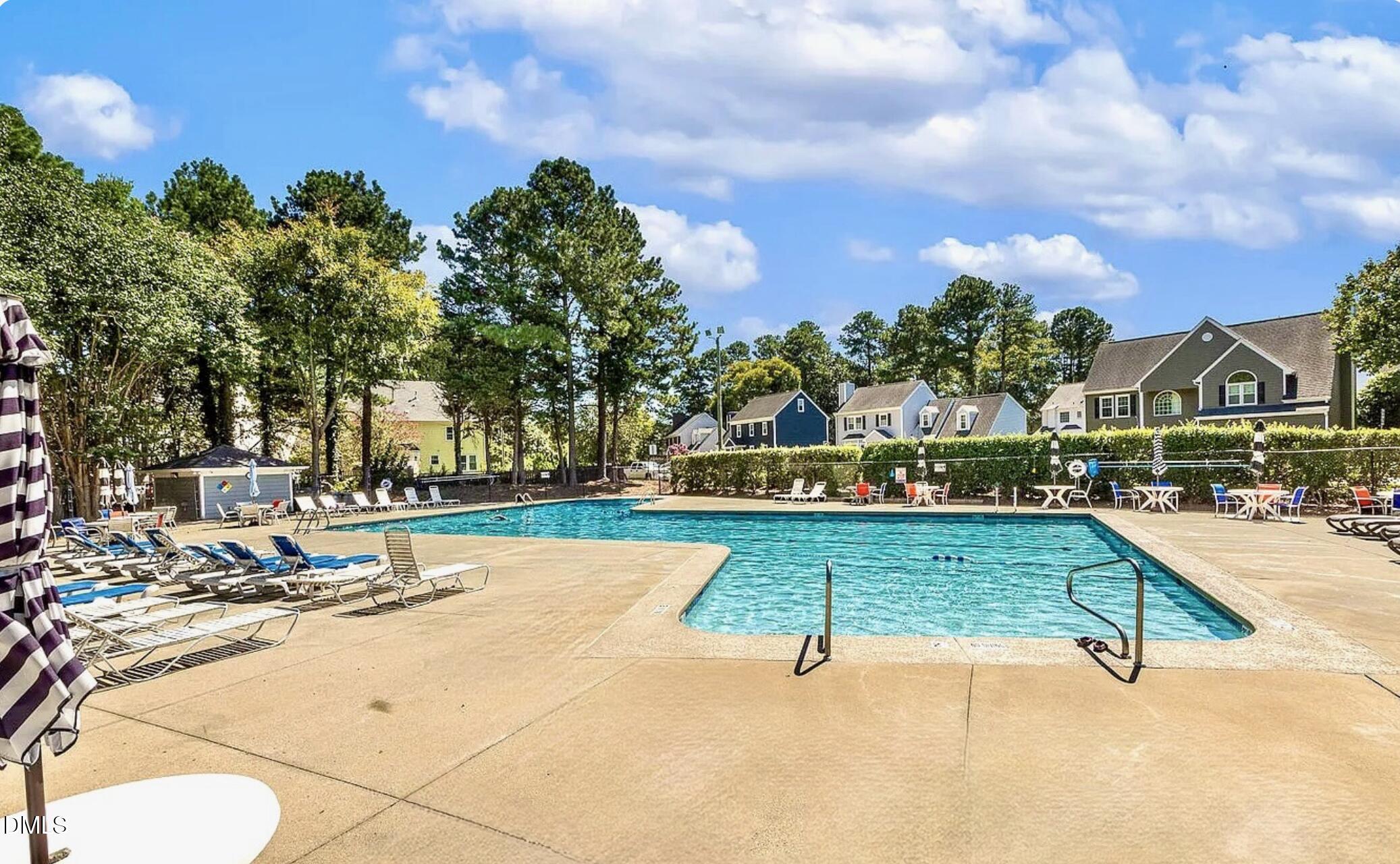 4204 Belington Court Raleigh, NC 27604 - Photo 17 of 18 a view of swimming pool with a lounge chairs