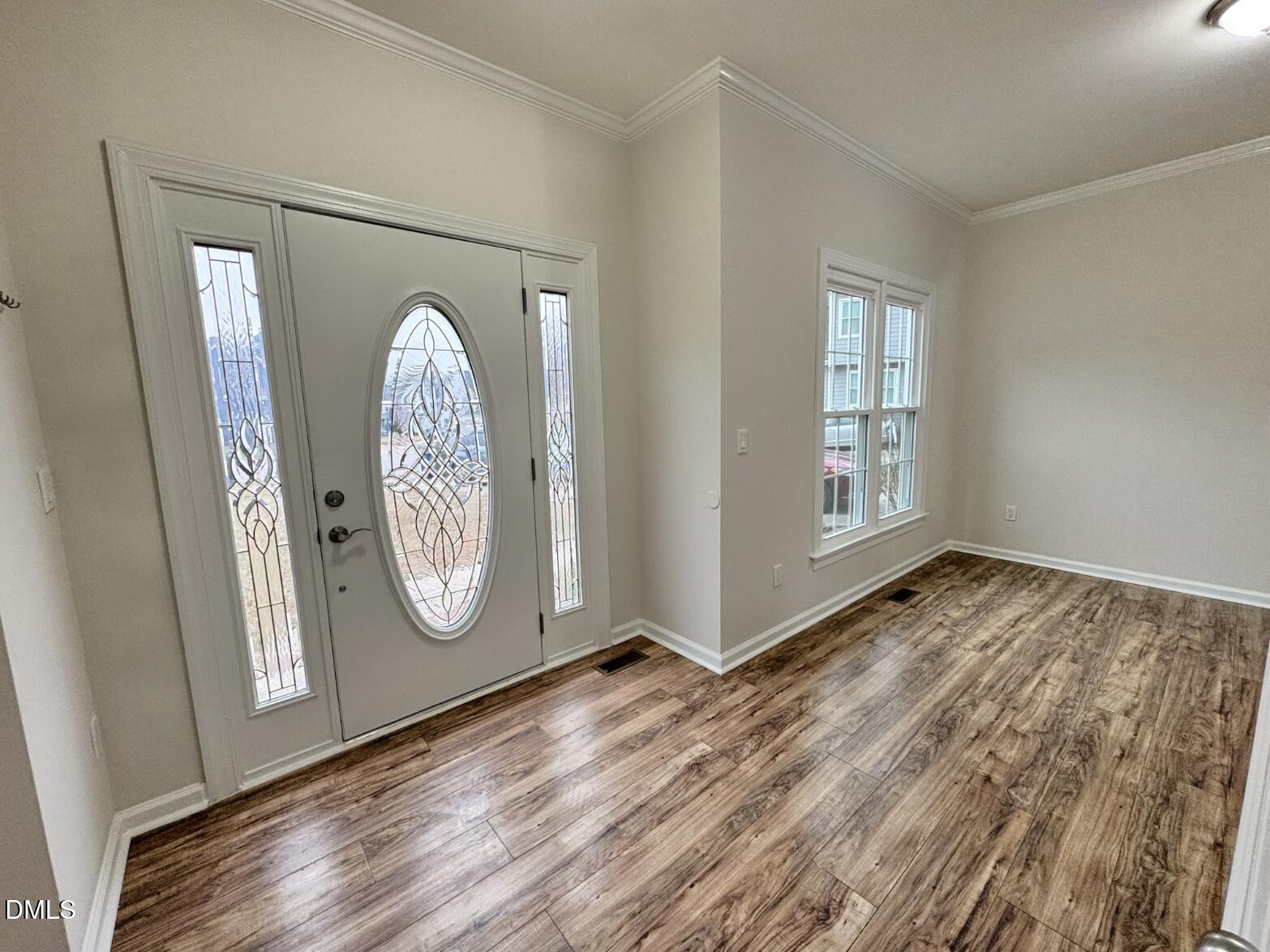 4204 Belington Court Raleigh, NC 27604 - Photo 2 of 18 a view of front door with wooden floor