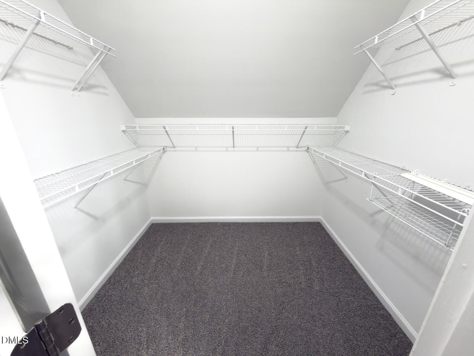 4204 Belington Court Raleigh, NC 27604 - Photo 6 of 18 a view of a room with racks on the wall