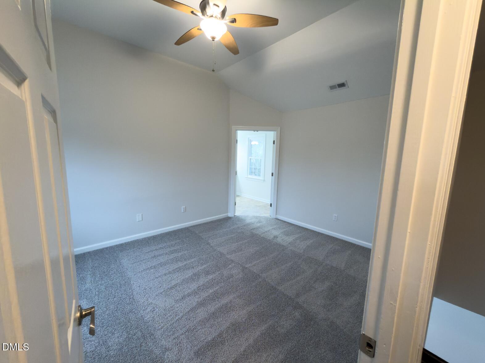 4204 Belington Court Raleigh, NC 27604 - Photo 10 of 18 an empty room with a empty space and a window