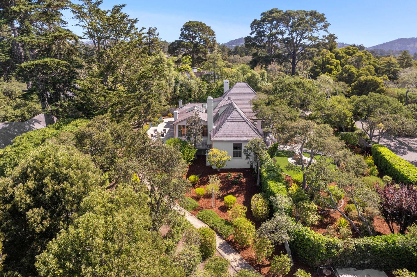 25560 Shafter Way Carmel, CA 93923 - Photo 4 of 4 a front view of a house with a yard