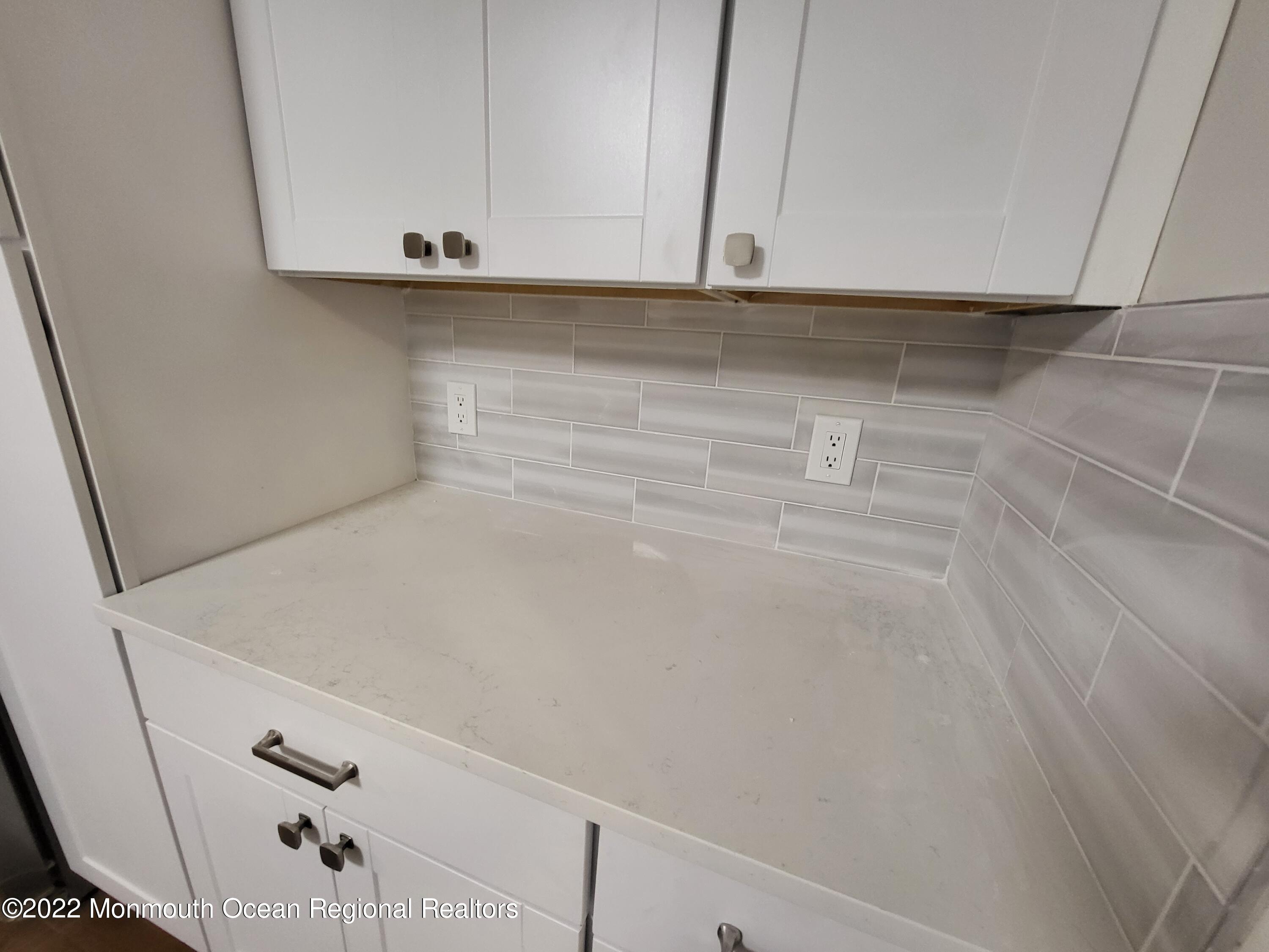 13 Spicy Pond Road Howell, NJ 07731 - Photo 6 of 7 a view of an empty walk in closet