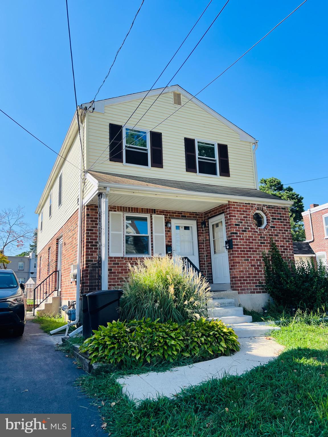 37 East Madison Avenue Clifton Heights, PA 19018 - Photo 1 of 17 a front view of a house with garden