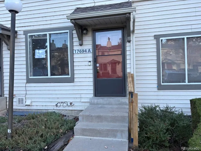 a front view of a house with windows