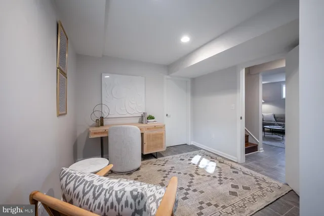 a room with a chair and a table in it