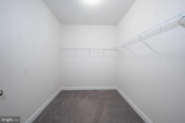 a bathroom with a sink double vanity and a mirror