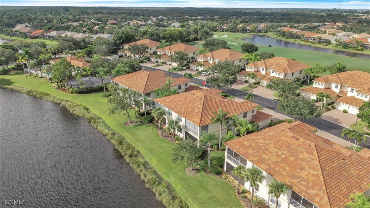 3110 Meandering Way, Unit 101 Fort Myers, FL 33905 - Photo 49 of 50 an aerial view of residential houses with outdoor space and river