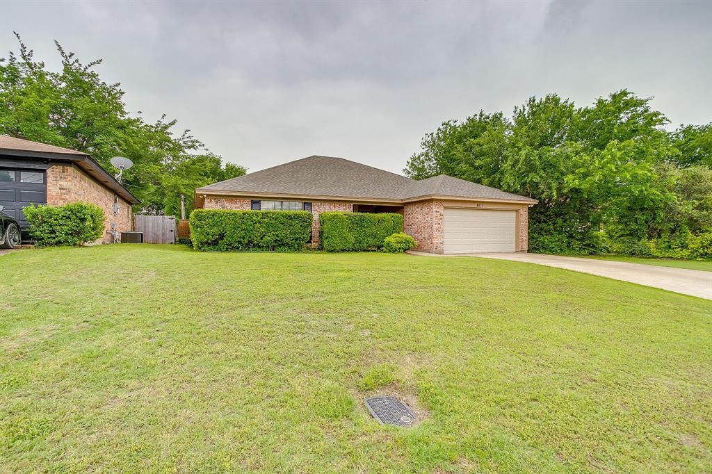 8613 Silver Creek Road White Settlement, TX 76108 - Photo 35 of 40 a front view of house with yard and green space
