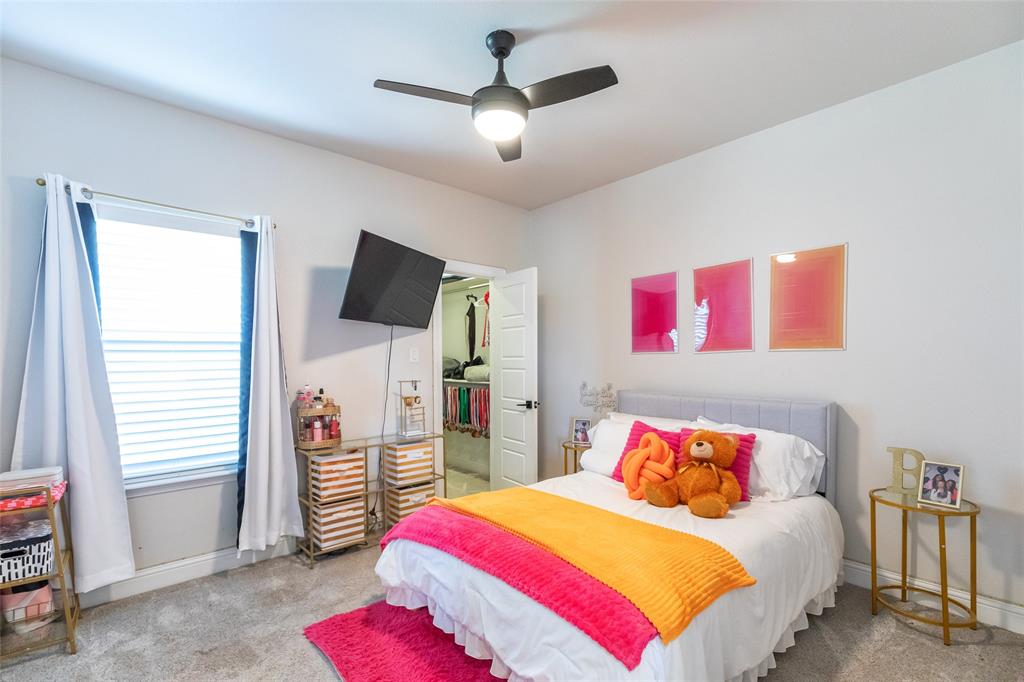 296 Mesquite Ridge Lane Lawn, TX 79530 - Photo 25 of 35 a bedroom with a bed and a flat screen tv
