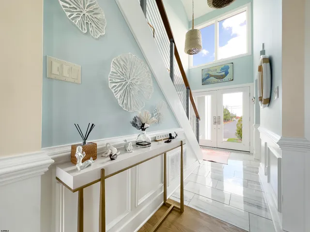 a bathroom with a sink a mirror and a shower