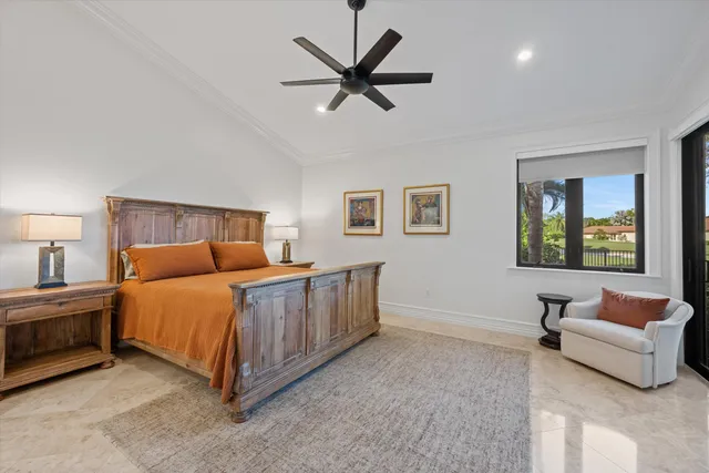 a bed room with bed and window