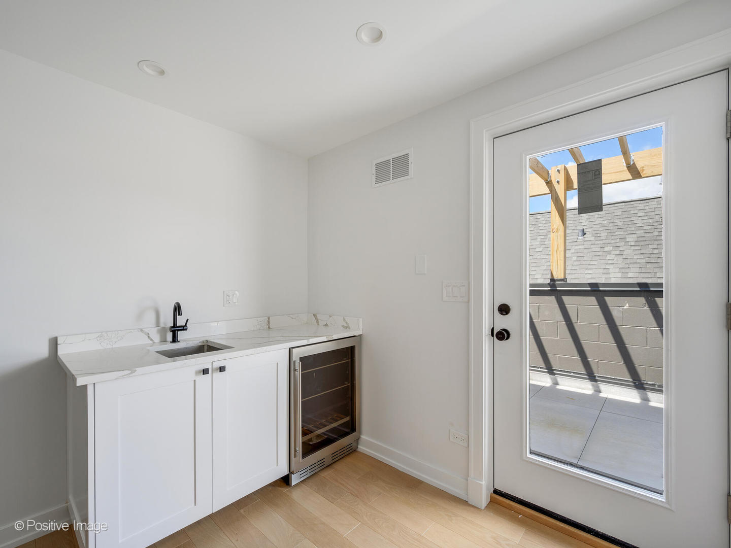 867 North Marshfield Avenue, Unit 3 Chicago, IL 60622 - Photo 12 of 26 a bathroom with a sink and a mirror