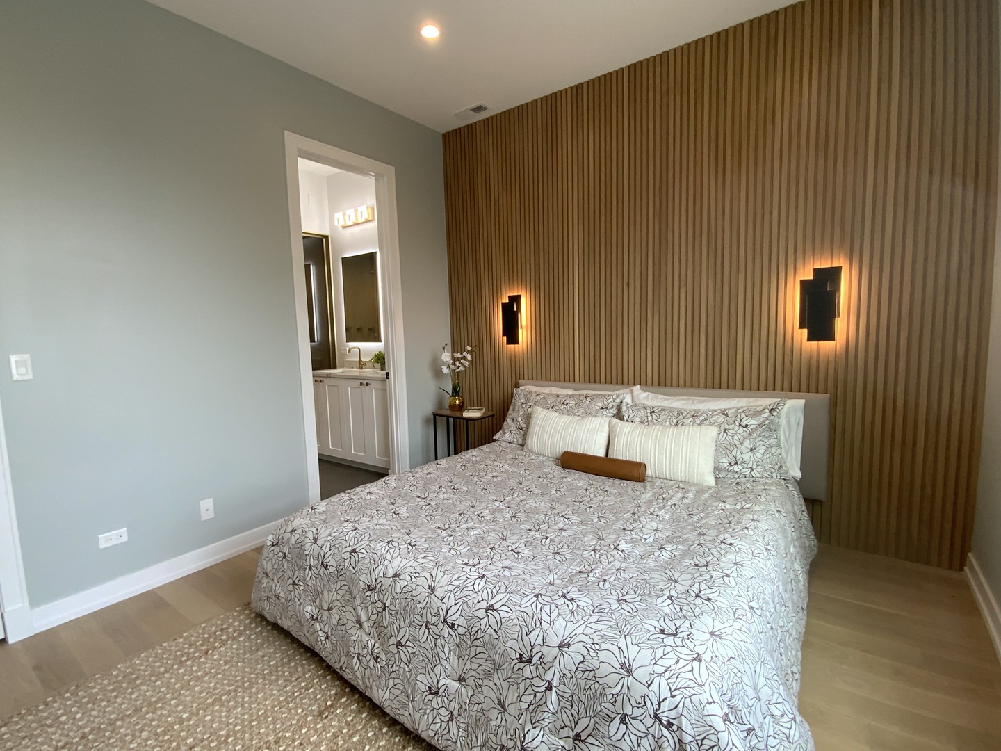 867 North Marshfield Avenue, Unit 3 Chicago, IL 60622 - Photo 17 of 26 a bedroom with a bed and a dresser