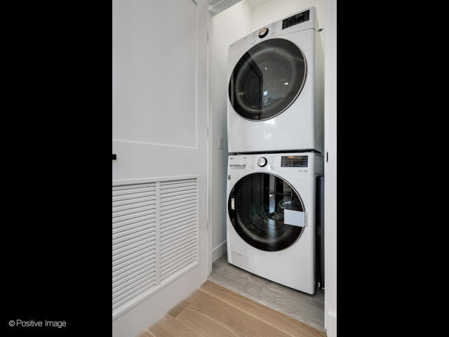 867 North Marshfield Avenue, Unit 3 Chicago, IL 60622 - Photo 26 of 26 a view of a hallway with washer and dryer