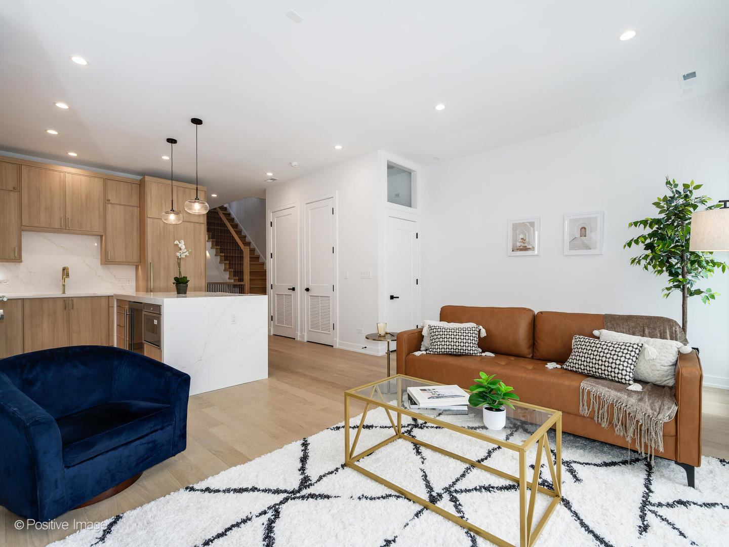 867 North Marshfield Avenue, Unit 3 Chicago, IL 60622 - Photo 5 of 26 a living room with furniture and a wooden floor