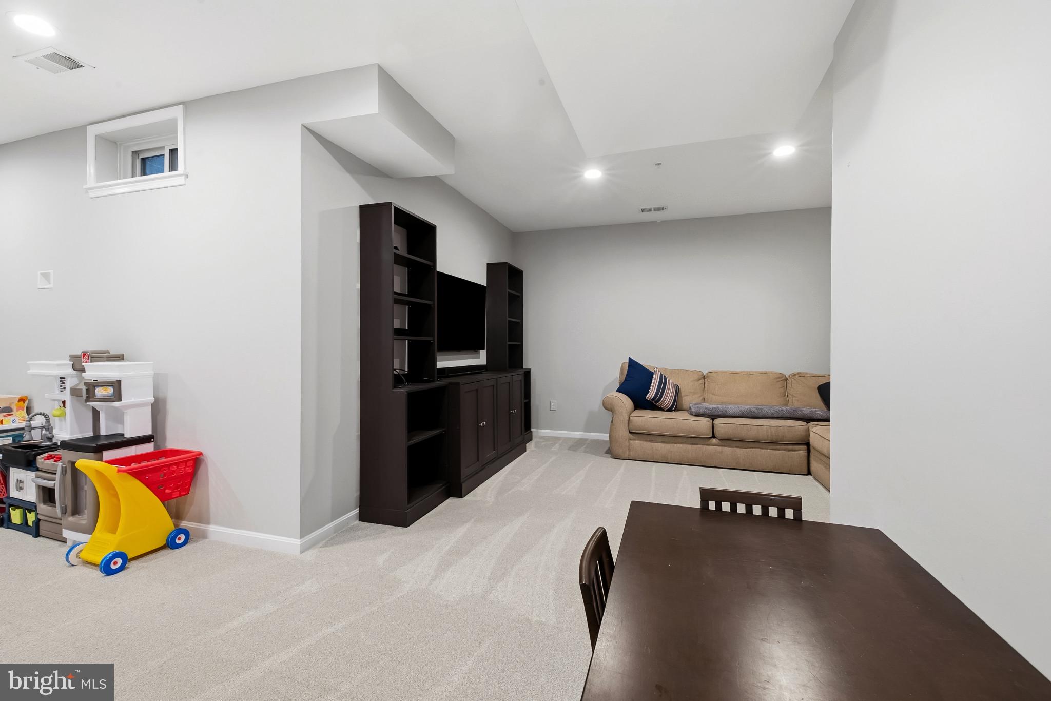 678 Stonegate Road Westminster, MD 21157 - Photo 29 of 41 lower level rec room new carpet