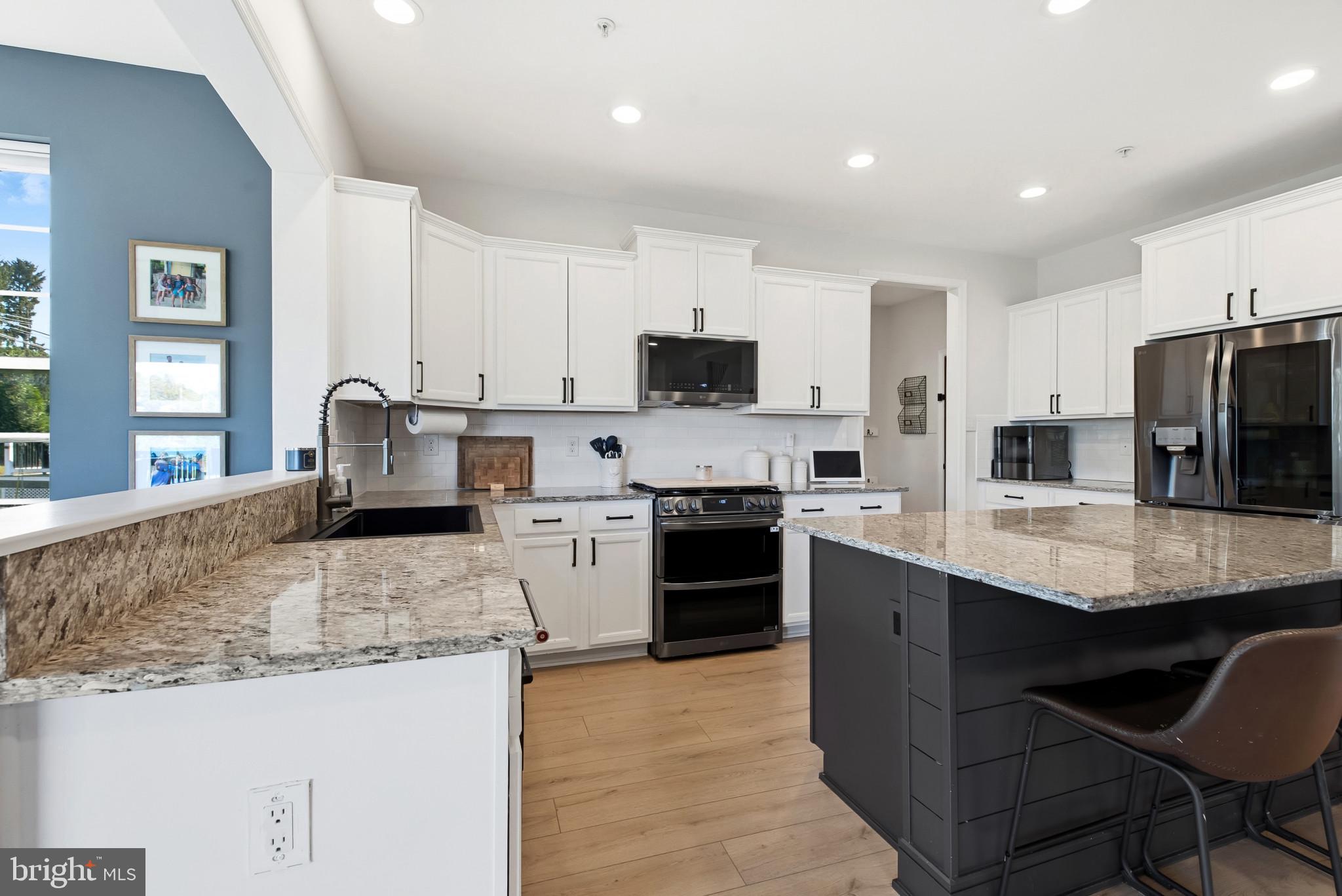 678 Stonegate Road Westminster, MD 21157 - Photo 7 of 41 expansive kitchen with updated appliances March'25