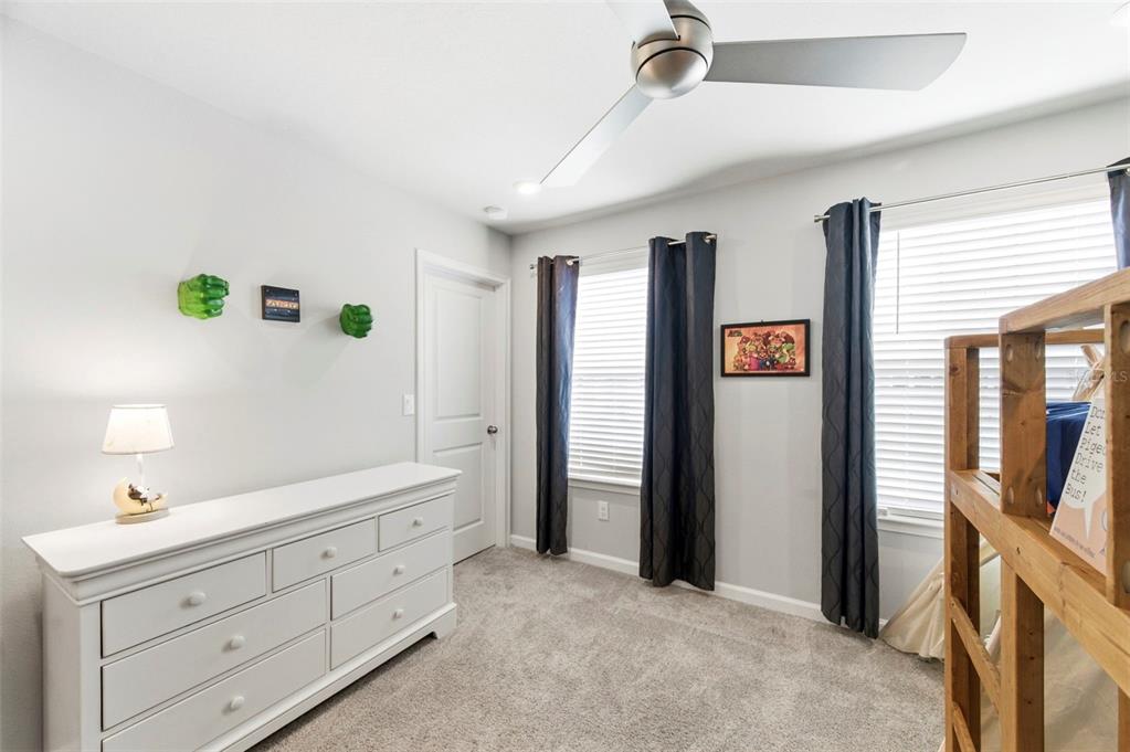 4327 Cloud Hopper Way Lutz, FL 33559 - Photo 36 of 75 a spacious bathroom with a double vanity sink and a mirror