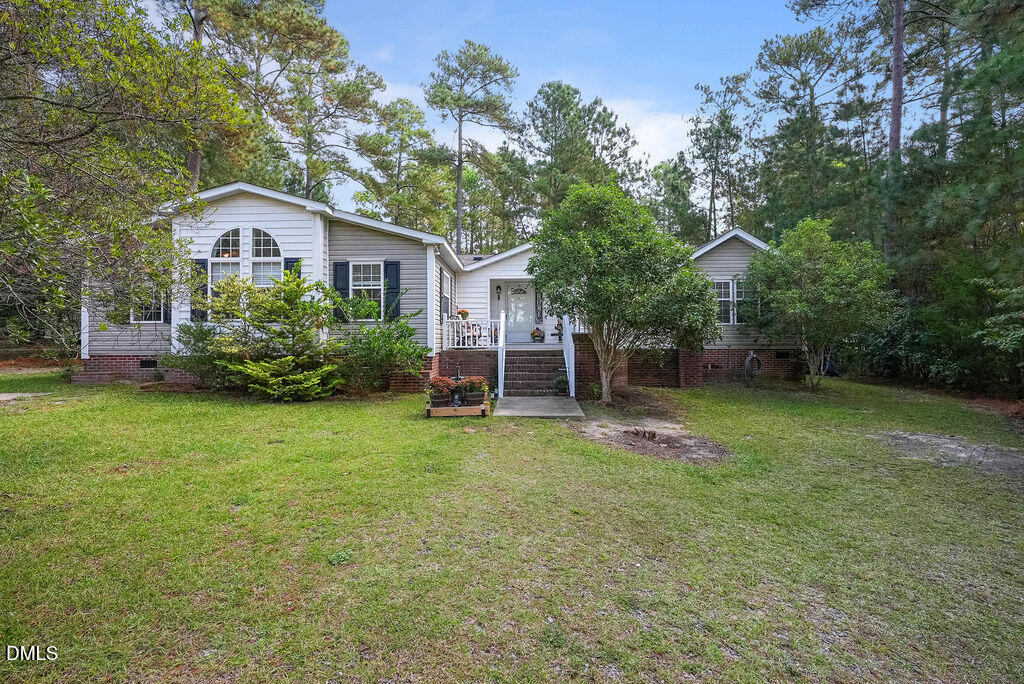 a house view with a garden space