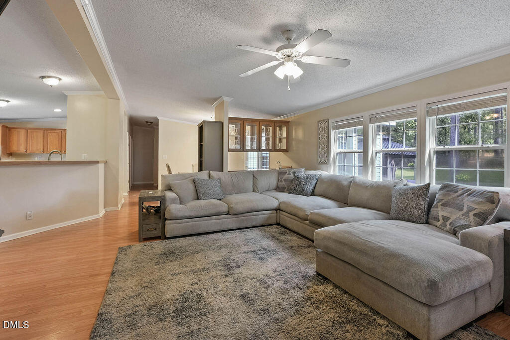 251 Ridge View Drive Cameron, NC 28326 - Photo 11 of 44 a living room with furniture and a large window