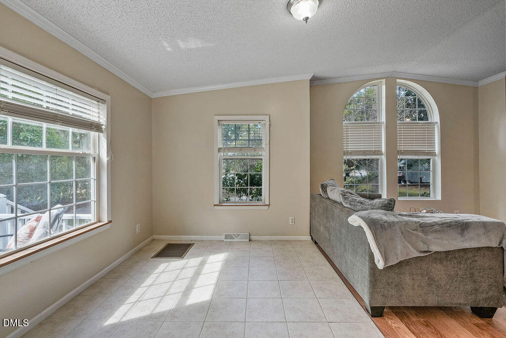 251 Ridge View Drive Cameron, NC 28326 - Photo 13 of 44 a living room with furniture and a large window