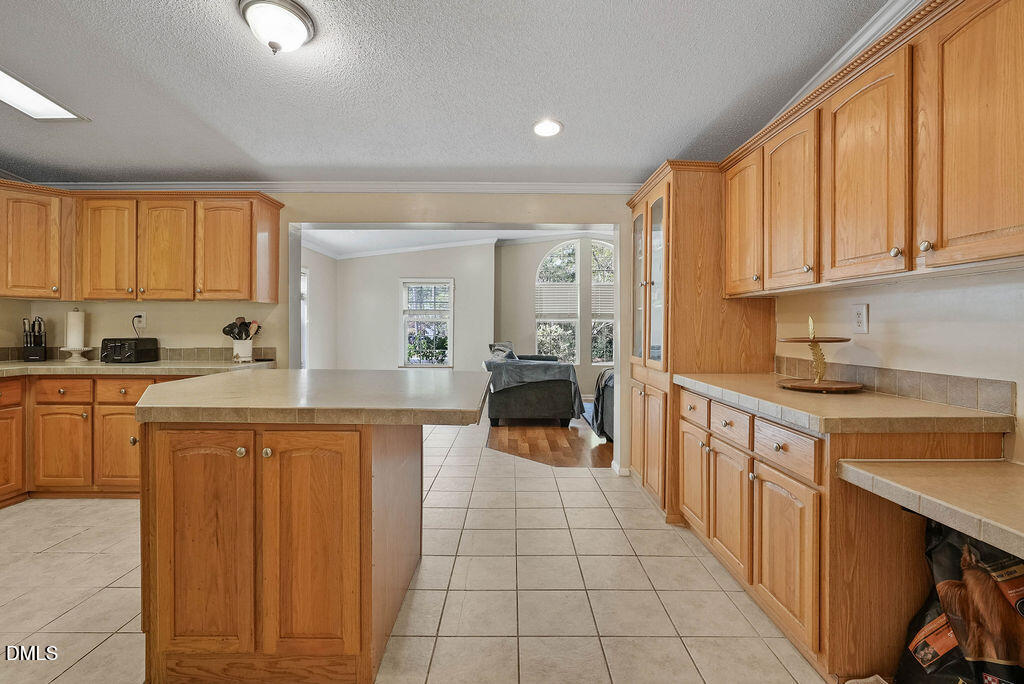 251 Ridge View Drive Cameron, NC 28326 - Photo 16 of 44 a kitchen with stainless steel appliances granite countertop a stove a sink dishwasher and a refrigerator