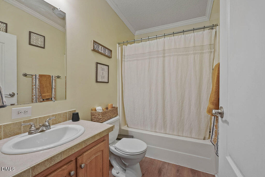 251 Ridge View Drive Cameron, NC 28326 - Photo 34 of 44 a bathroom with a sink toilet and shower
