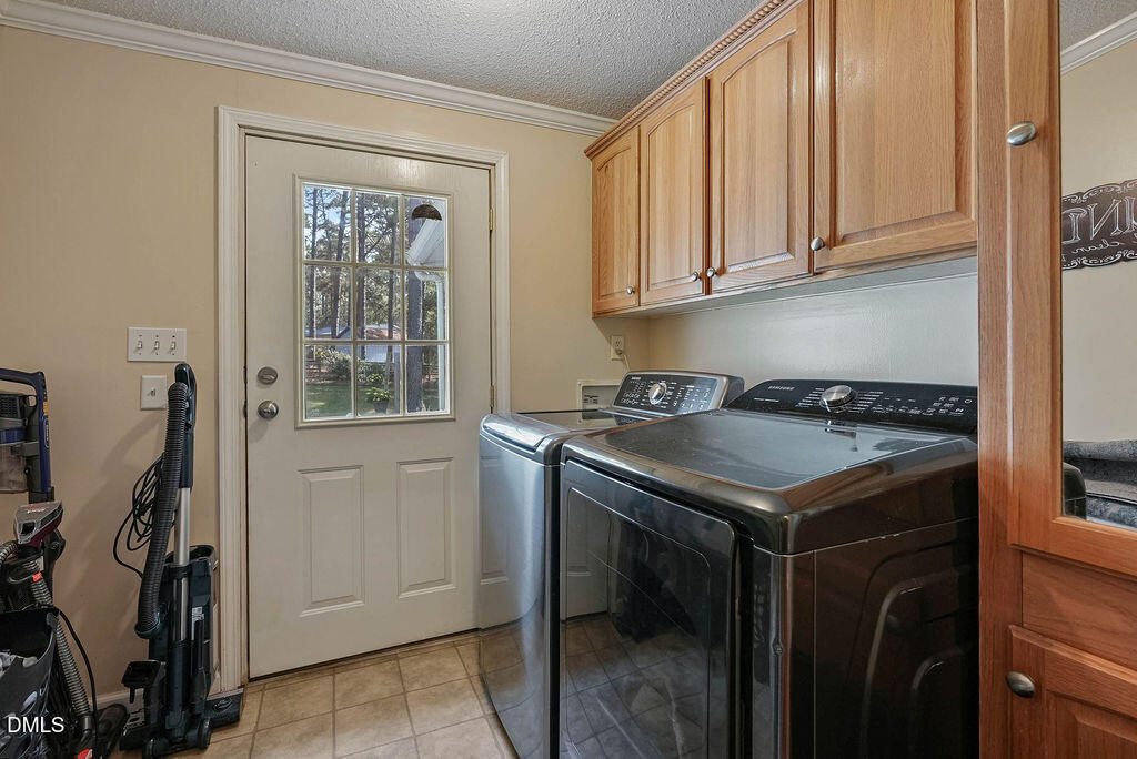 251 Ridge View Drive Cameron, NC 28326 - Photo 35 of 44 a kitchen with a stove and a microwave