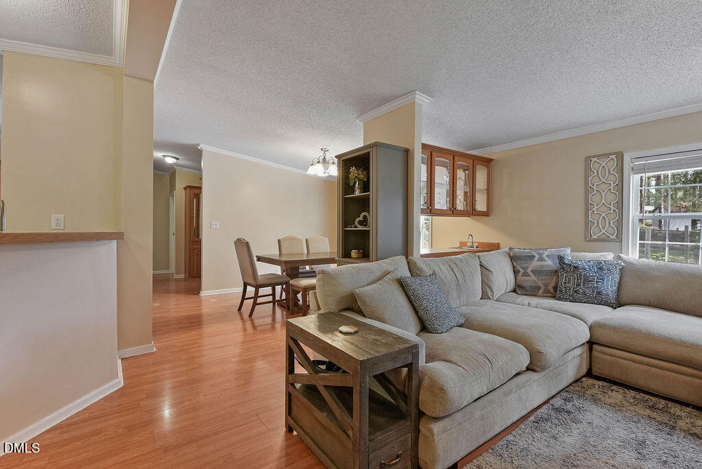 251 Ridge View Drive Cameron, NC 28326 - Photo 8 of 44 a living room with furniture and a wooden floor