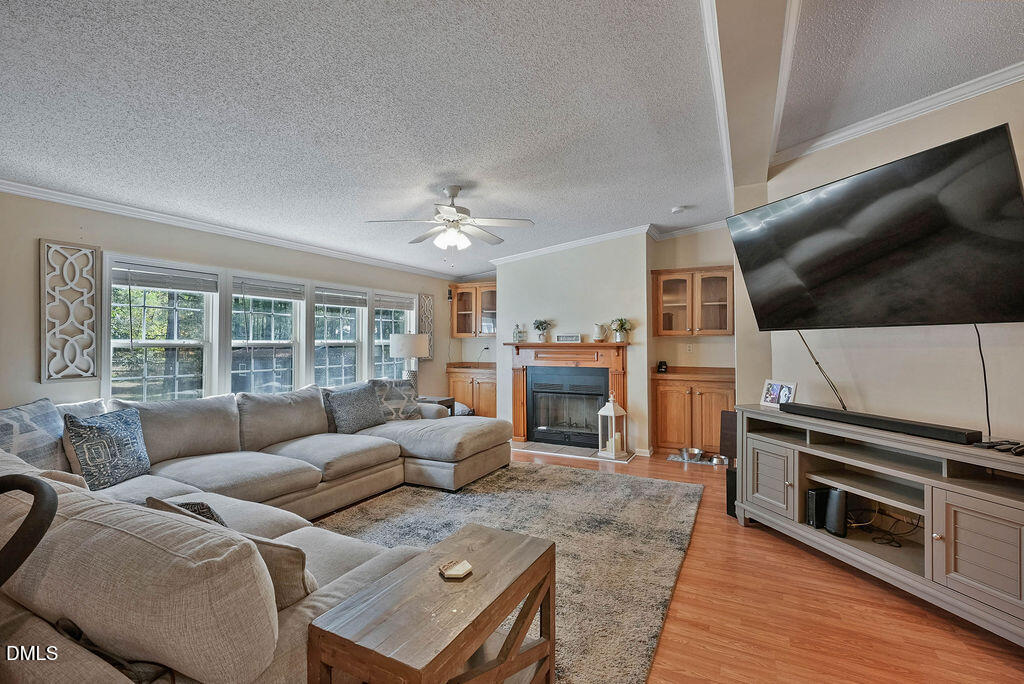 251 Ridge View Drive Cameron, NC 28326 - Photo 9 of 44 a living room with furniture and a flat screen tv