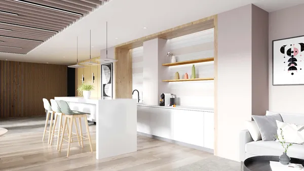 a living room with kitchen island a table and chairs