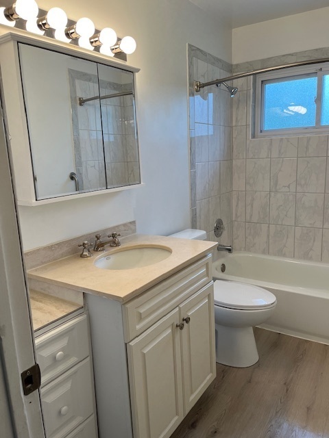 3027 Wilshire Avenue Markham, IL 60428 - Photo 11 of 16 a bathroom with a sink toilet and shower
