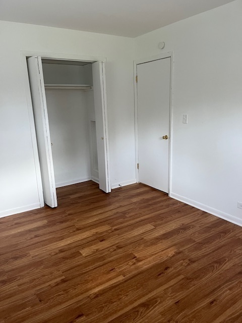3027 Wilshire Avenue Markham, IL 60428 - Photo 14 of 16 a view of empty room with wooden floor