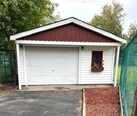 a house with trees in the background