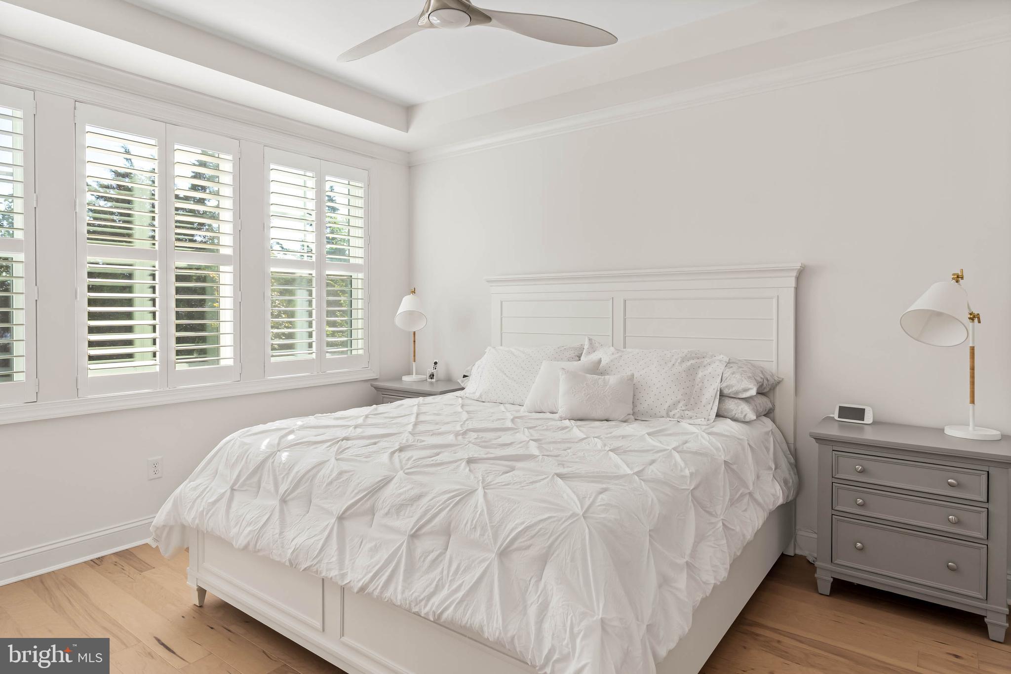 30468 Madeira Lane Ocean View, DE 19970 - Photo 11 of 56 a bedroom with a bed and a window