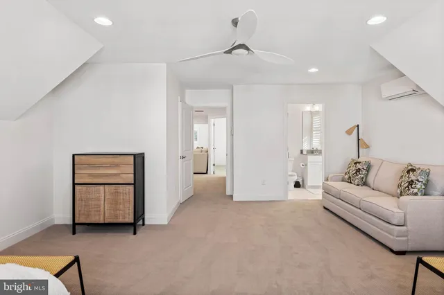 a view of a wooden chairs and table on the deck