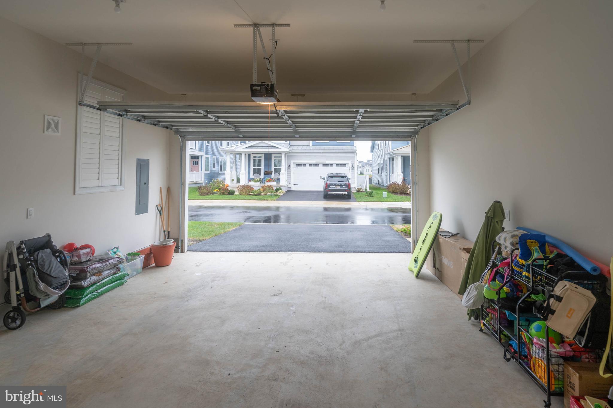 30468 Madeira Lane Ocean View, DE 19970 - Photo 38 of 56 a living room with furniture and a flat screen tv