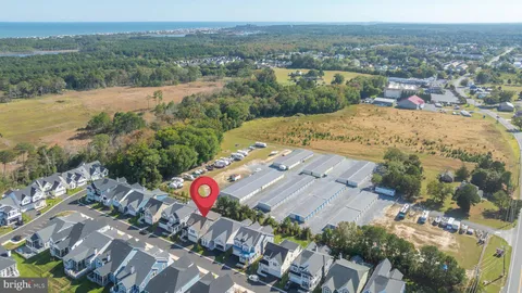 a view of a swimming pool with a yard