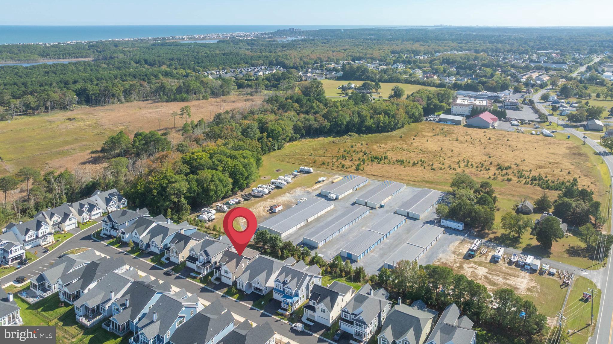 30468 Madeira Lane Ocean View, DE 19970 - Photo 49 of 56 an aerial view of residential houses with outdoor space