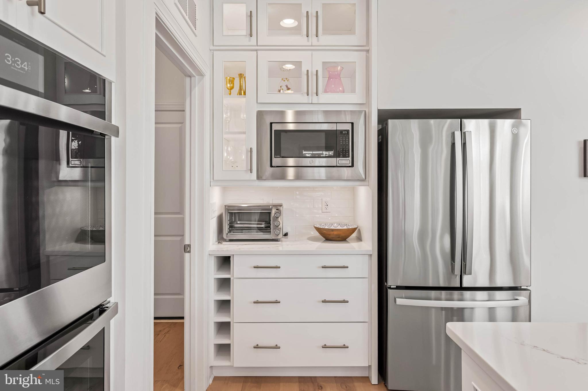 30468 Madeira Lane Ocean View, DE 19970 - Photo 8 of 56 a bathroom with a sink and a mirror
