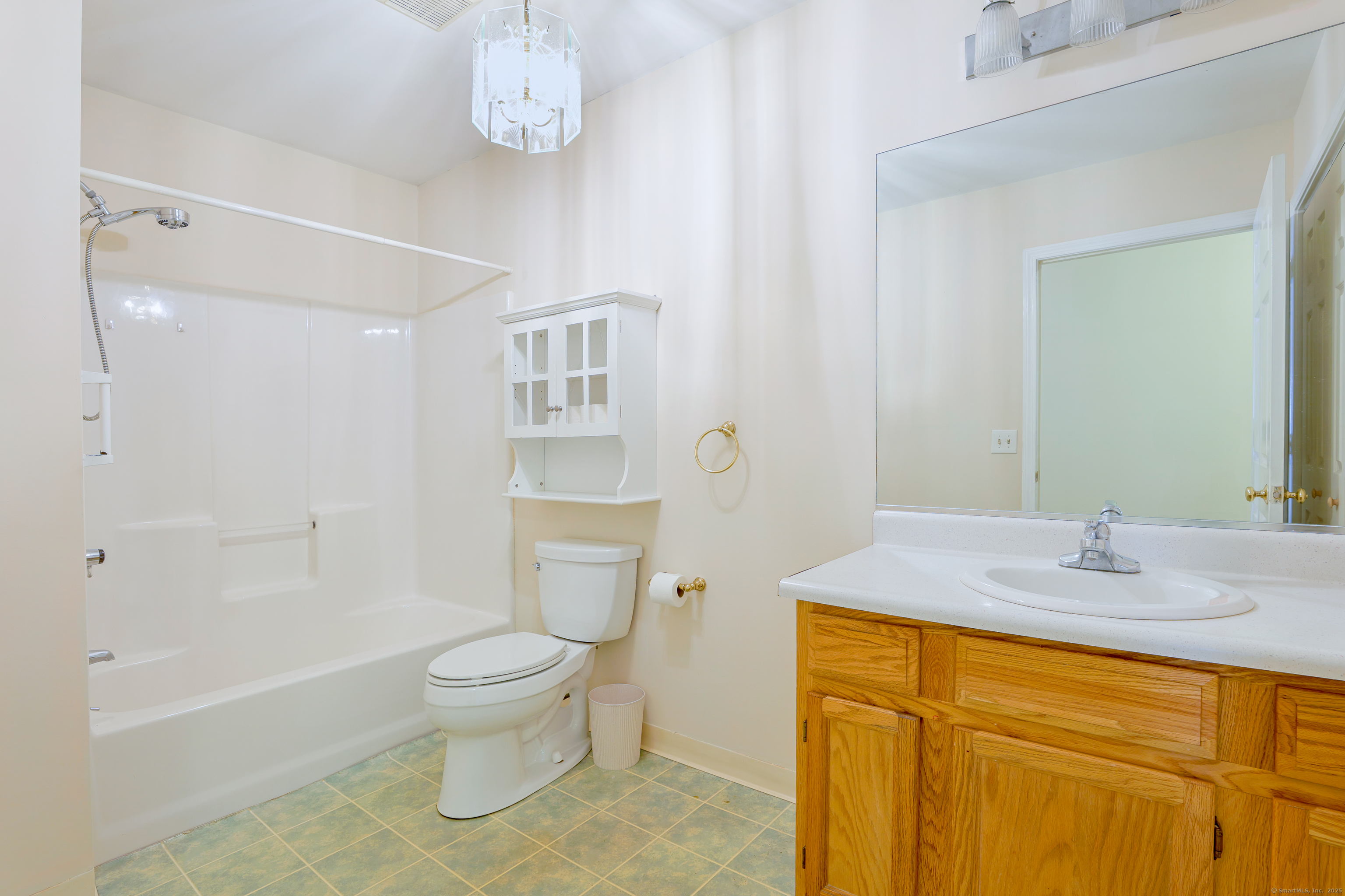 150 Forest Road, Unit 6 Milford, CT 06461 - Photo 13 of 26 a bathroom with a sink a toilet and shower