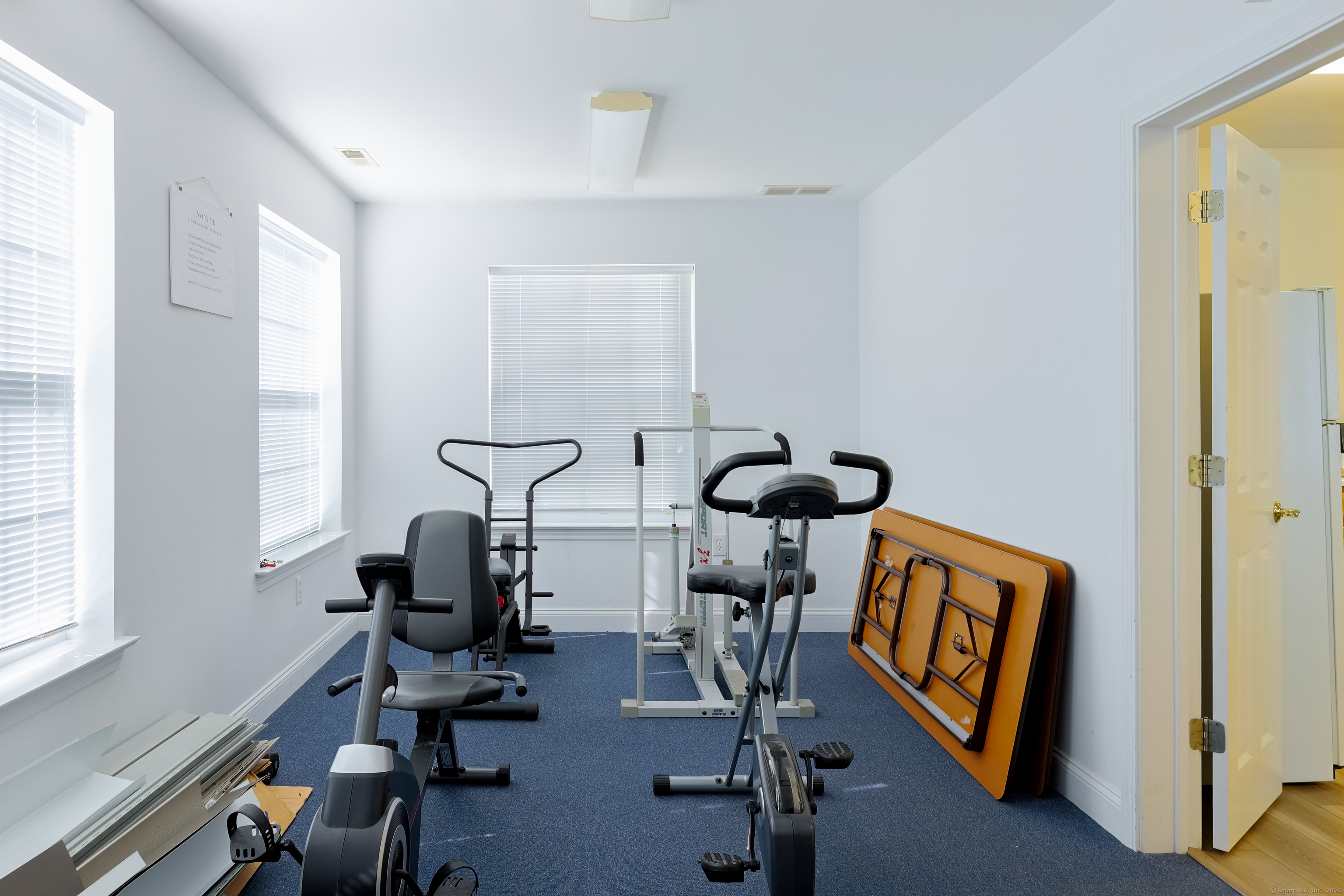150 Forest Road, Unit 6 Milford, CT 06461 - Photo 25 of 26 a view of a workspace with furniture and a window
