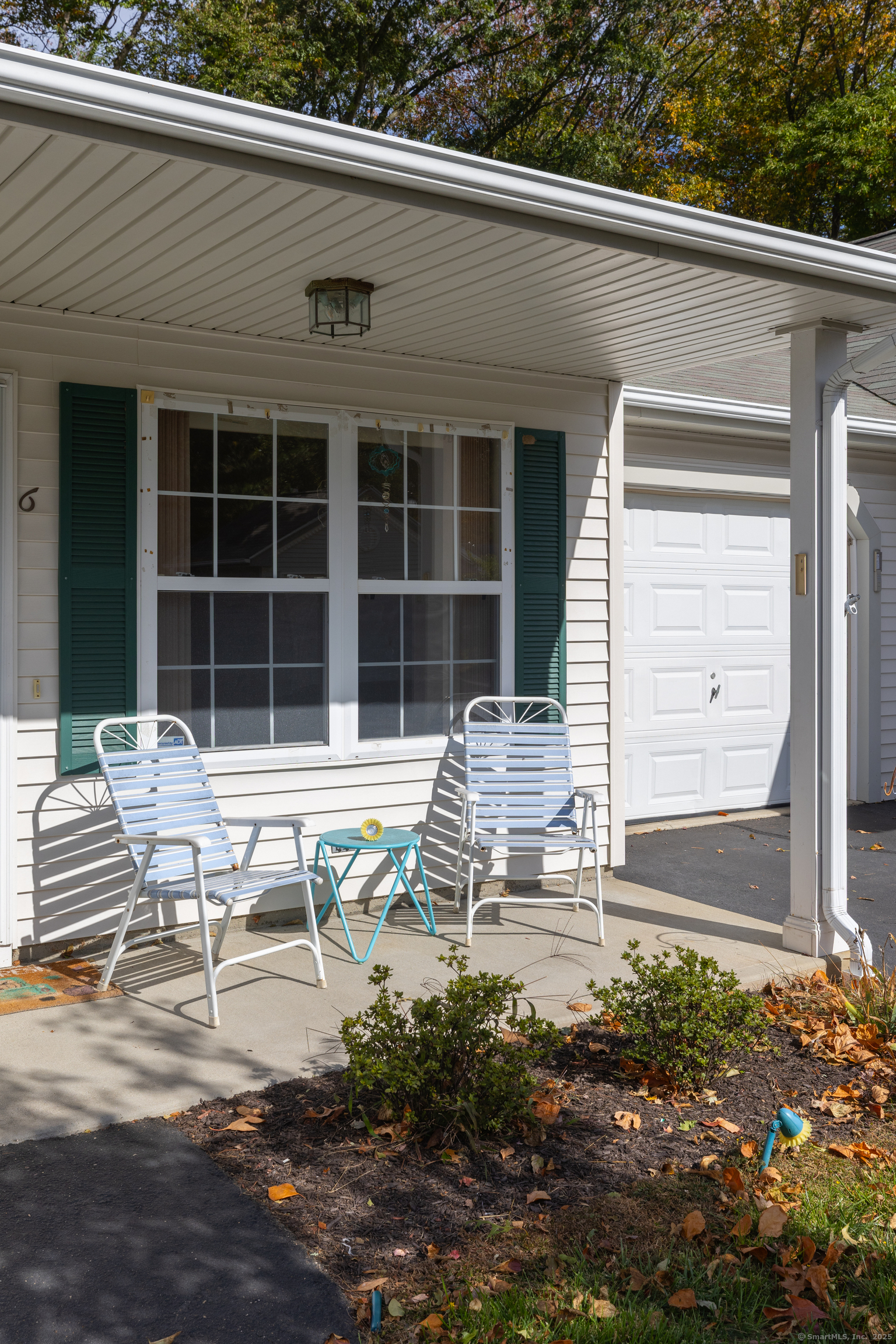 150 Forest Road, Unit 6 Milford, CT 06461 - Photo 4 of 26 a front view of a house with a yard