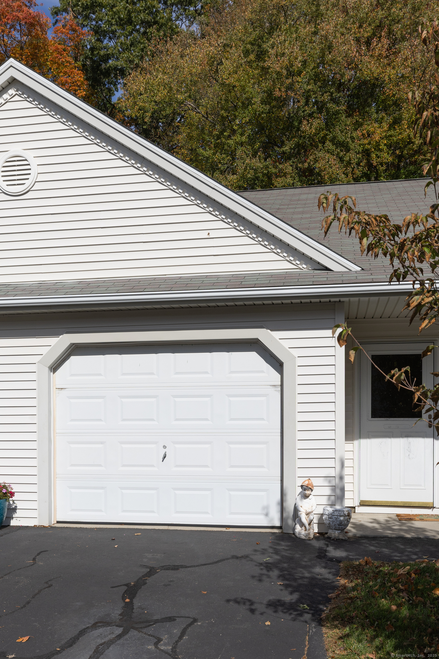 150 Forest Road, Unit 6 Milford, CT 06461 - Photo 5 of 26 a view of a white house