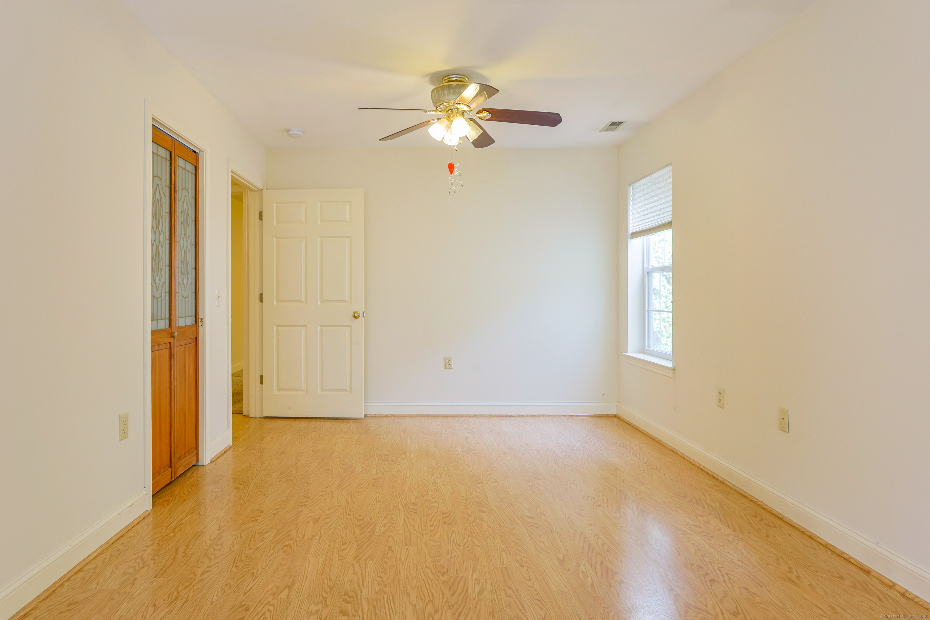 150 Forest Road, Unit 6 Milford, CT 06461 - Photo 7 of 26 a view of a livingroom with a window