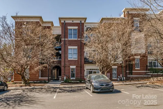 a car parked in front of a building