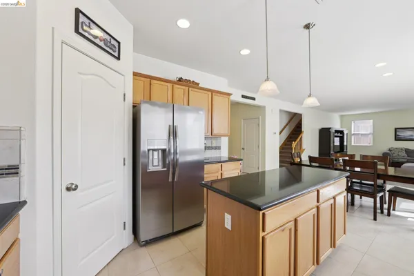 a bedroom with a bed and a furniture